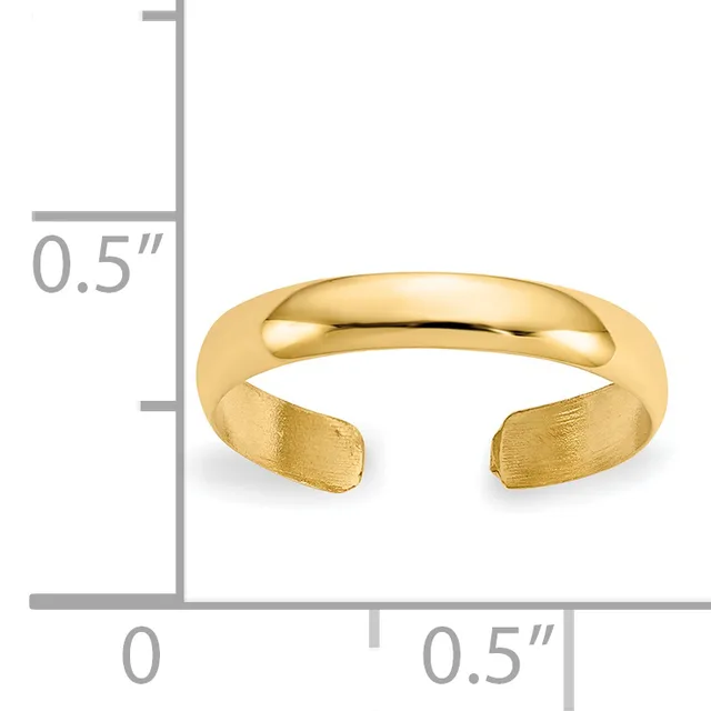 A polished gold cuff bracelet with curved, open ends displayed next to a measurement scale showing approximately 0.5 inches in height and width.
