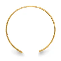 A gold-toned open cuff bracelet with a textured surface, shown against a white background.