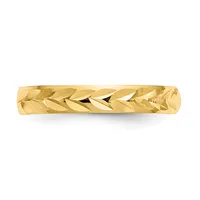 A gold band ring with a textured surface featuring a diagonal leaf or chevron pattern, shown against a white background.