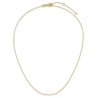A delicate gold chain necklace with an adjustable clasp and length extender, displayed against a white background.