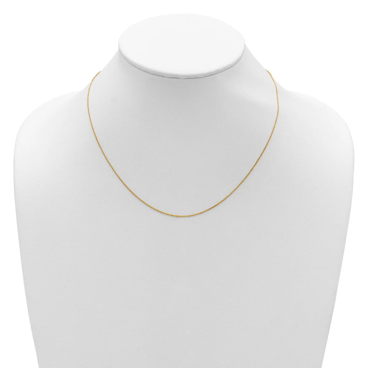 A thin gold-toned chain necklace displayed on a white mannequin bust.