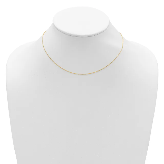 A thin gold-toned chain necklace displayed on a white mannequin bust.