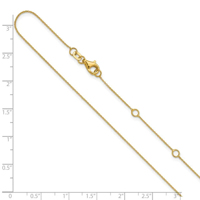 Gold-toned chain necklace with a lobster clasp at the top and decorative circular links spaced along its length, displayed against a ruler showing approximately 3 inches.