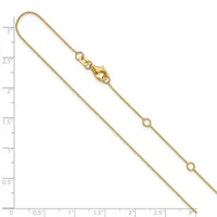 Gold-toned chain necklace with a lobster clasp at the top and decorative circular links spaced along its length, displayed against a ruler showing approximately 3 inches.