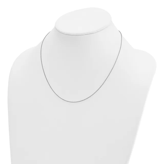 A thin silver-toned chain necklace displayed on a white mannequin bust.