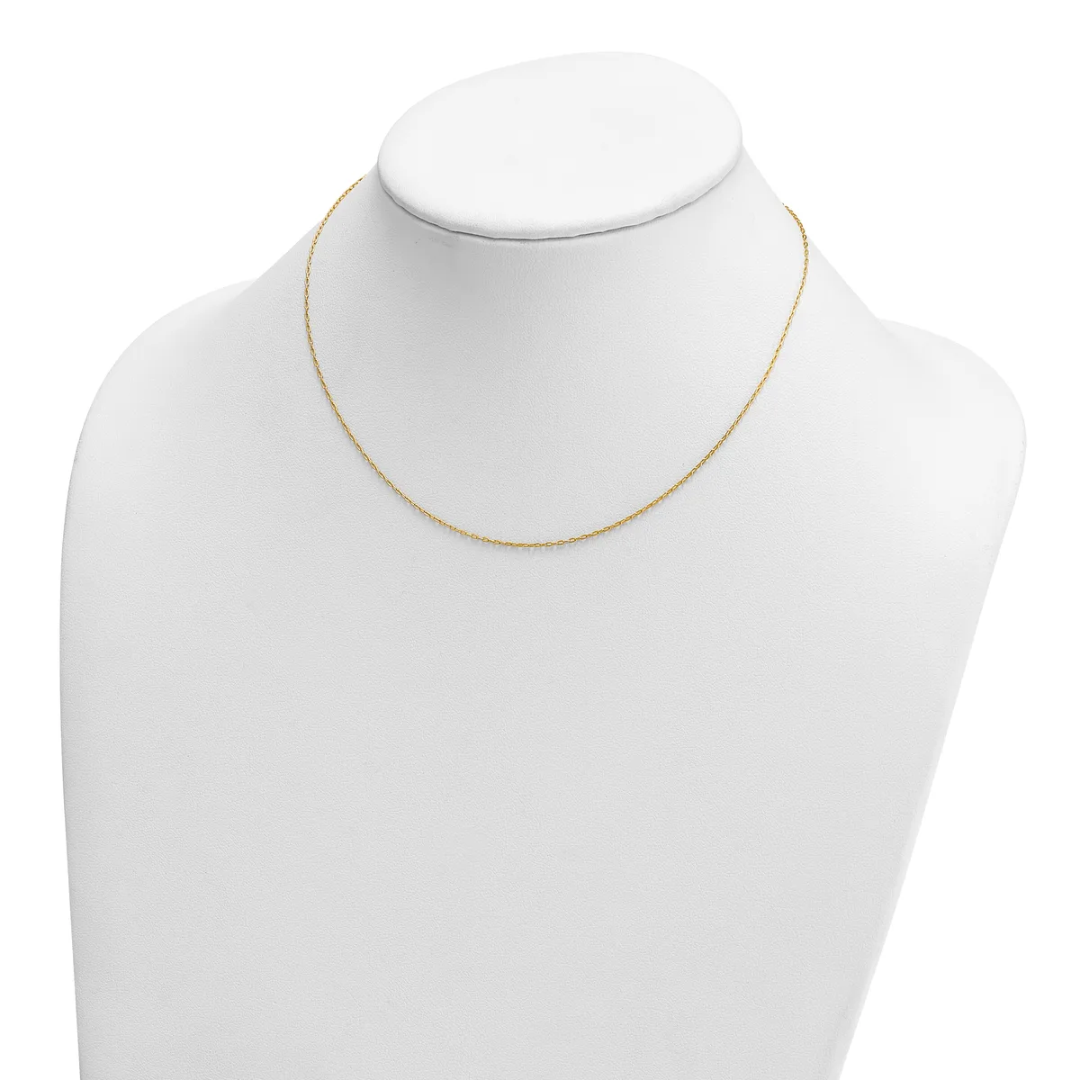 A delicate gold-toned chain necklace displayed on a white mannequin bust against a white background.
