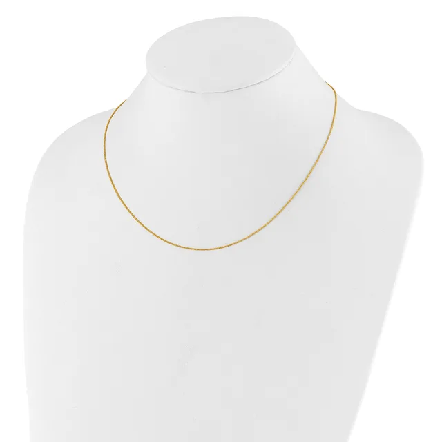 A thin gold-toned snake chain necklace displayed on a white mannequin bust.