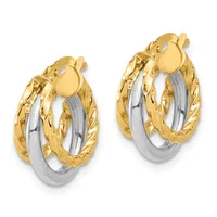 Pair of two-tone gold hoop earrings with textured outer bands and smooth inner bands, featuring clip-on closures.