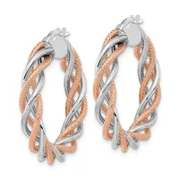 Pair of twisted hoop earrings with two-tone finish featuring rose gold textured strands woven with silver polished bands, shown from front view.