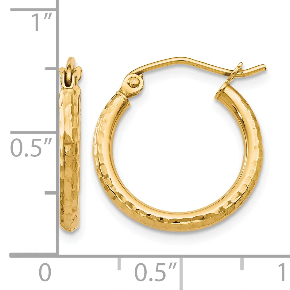 A pair of gold hoop earrings with a textured hammered finish and hinged closure posts, shown next to a ruler measuring approximately 0.75 inches in diameter.