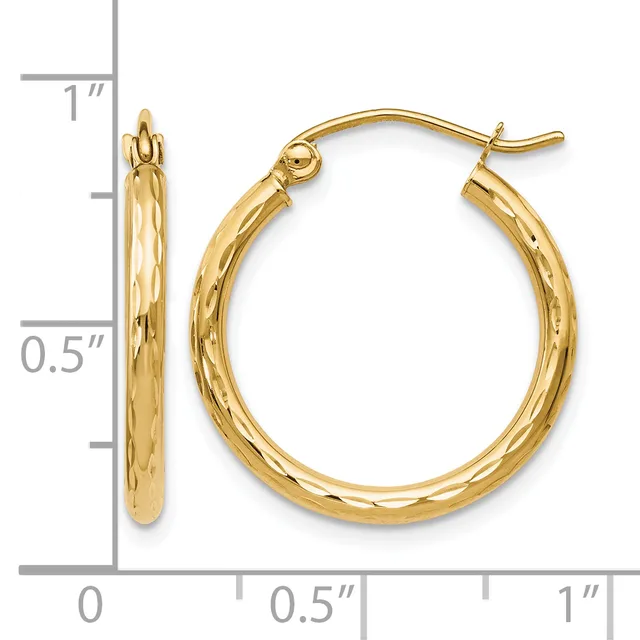 Pair of polished gold hoop earrings with textured surface and lever-back closures, displayed against a measurement scale showing approximately one inch in diameter.