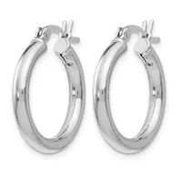 A pair of polished silver-toned hoop earrings with a thick, rounded profile and clip-style closures, displayed against a white background.
