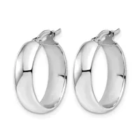 A pair of polished silver chunky hoop earrings with a smooth, rounded profile and hinged closures, displayed against a white background.