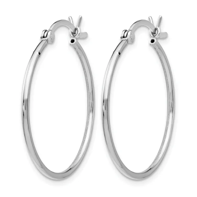 A pair of polished silver-toned hoop earrings with a smooth, rounded profile and hinged closures, displayed against a white background.