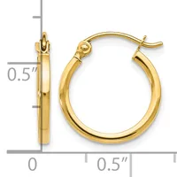 Pair of polished gold-colored hoop earrings with hinged closures, shown next to a measurement scale indicating approximately 0.5 inches in diameter.