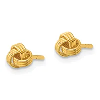 Pair of gold-colored knot stud earrings with posts and backs, shown from the front against a white background.