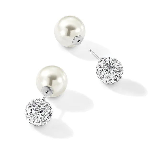 A pair of silver earrings with pearl studs connected to crystal-encrusted spheres by short posts, displayed against a white background.