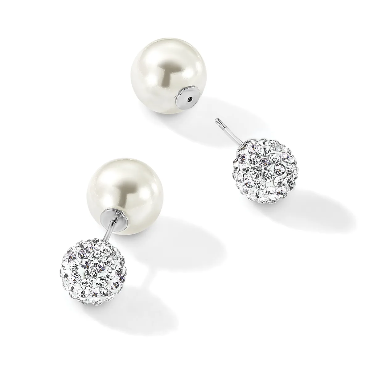 A pair of silver earrings with pearl studs connected to crystal-encrusted spheres by short posts, displayed against a white background.