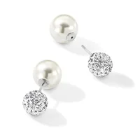 A pair of silver earrings with pearl studs connected to crystal-encrusted spheres by short posts, displayed against a white background.