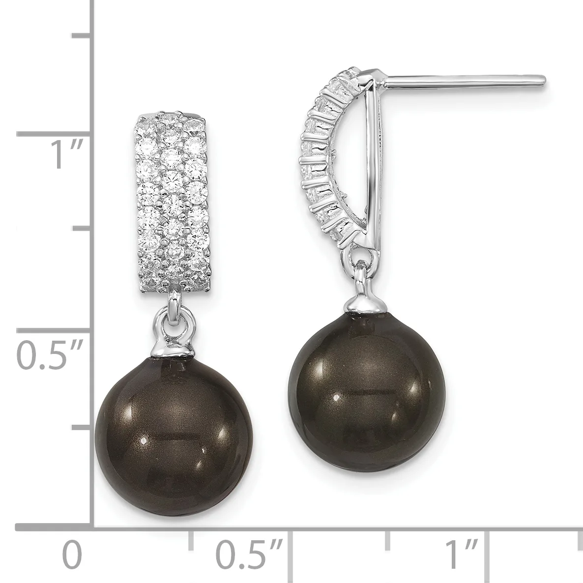 A pair of silver drop earrings with diamond-paved rectangular tops and dark pearl spheres suspended below, shown next to a measurement ruler.