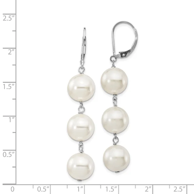 Pair of silver leverback earrings with three graduated white pearl spheres suspended on each side, displayed against a measurement scale.