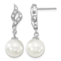 Pair of silver dangle earrings featuring twisted ribbon tops with cubic zirconia stones and round white pearl drops, shown from front and side views.