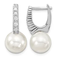 Pair of silver hoop earrings with diamond-set posts and white pearl drops, shown from front and side views.