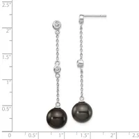 Silver dangle earrings with cubic zirconia studs, delicate chain links, and dark gray pearl drops, displayed against a measurement ruler.