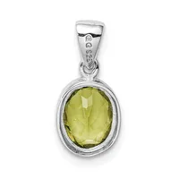 A silver pendant with an oval faceted lemon-yellow gemstone set in a bezel, suspended from a small decorative bail with a hallmark.