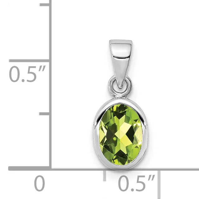 Silver pendant with oval faceted peridot stone in bezel setting, shown next to a ruler indicating approximately 0.5 inches in height and width.