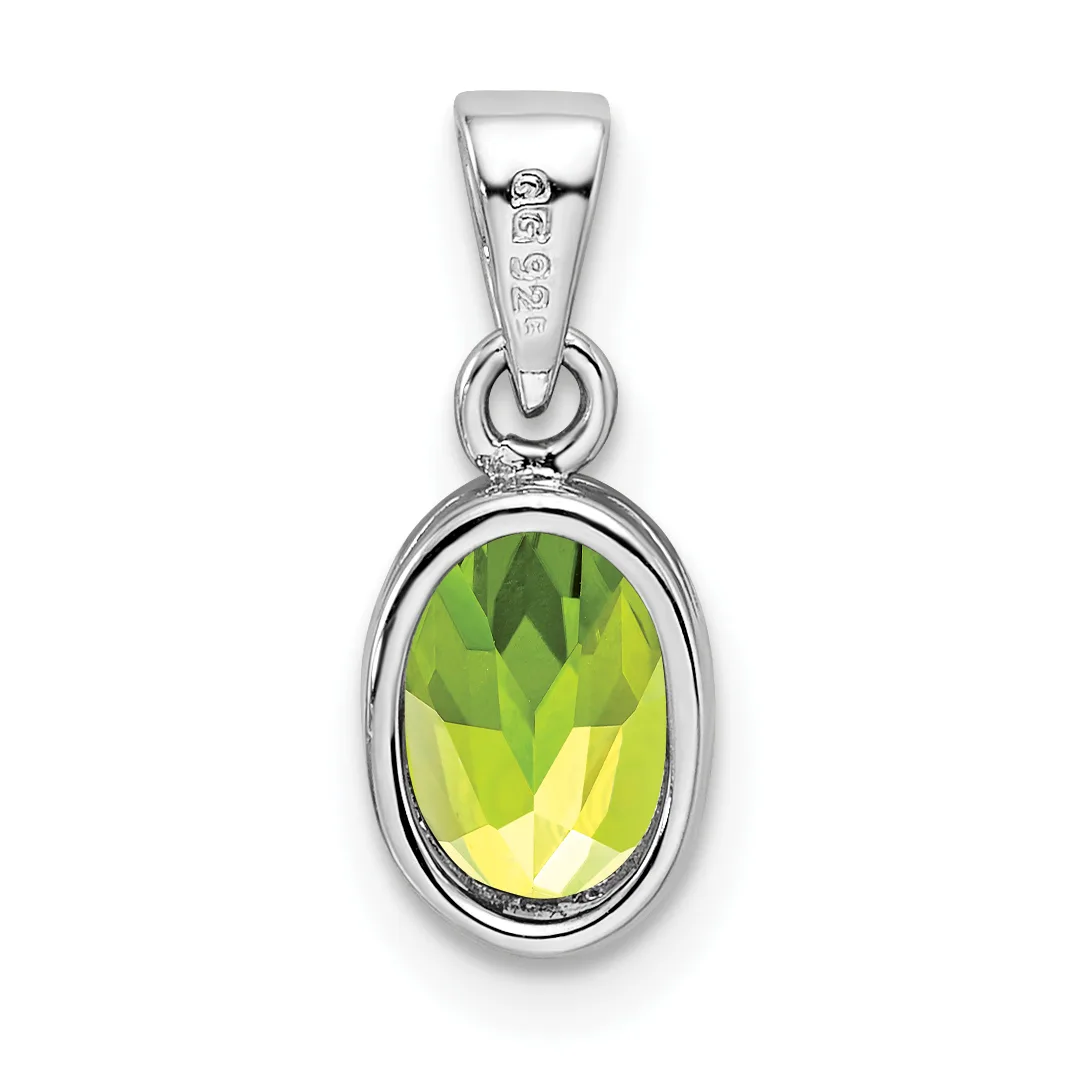 A silver pendant with an oval-cut yellow-green faceted gemstone in a bezel setting, suspended from a bailed loop with a small stamped hallmark.