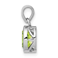 A silver rectangular pendant with bright green peridot stones and decorative cutout details, suspended from a silver loop bail.
