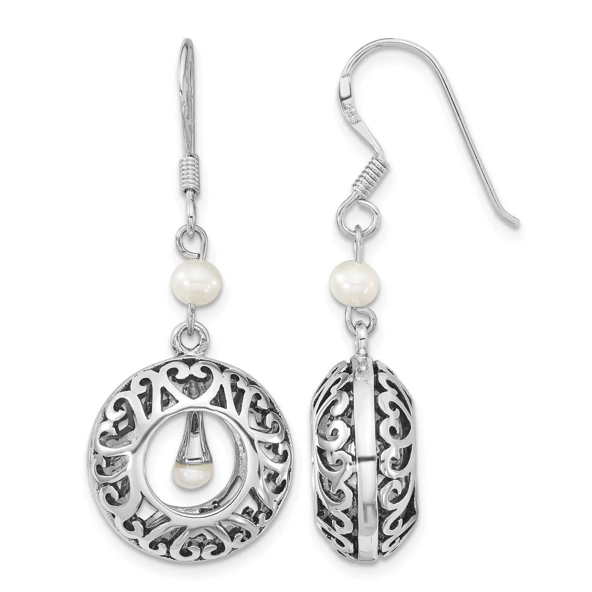 A pair of silver filigree circular earrings with pearl accents, shown from front and side views, hanging from curved ear wires.