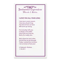 A greeting card with purple text and border displaying a poem titled "I Love You All Year Long" by Deborah J. Birdoes, dated 1-18-2011.