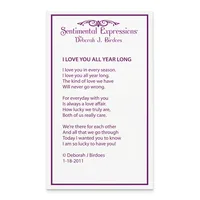 A greeting card with purple text and border featuring a poem titled "I Love You All Year Long" by Deborah J. Birdoes, dated 1-18-2011.