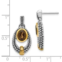 A pair of two-tone silver and gold dangle earrings with beaded borders, each featuring a faceted smoky quartz stone set in a gold oval frame.