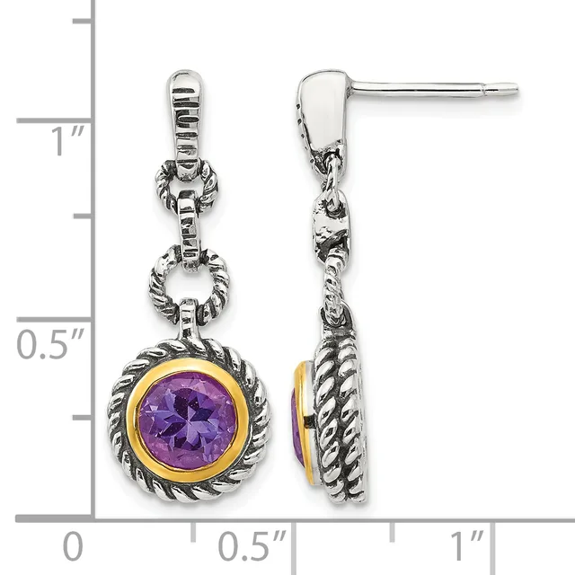 Pair of silver dangle earrings with twisted rope detailing, round purple amethyst stones set in gold bezels, and decorative connector links, shown front and back views next to a measurement scale.