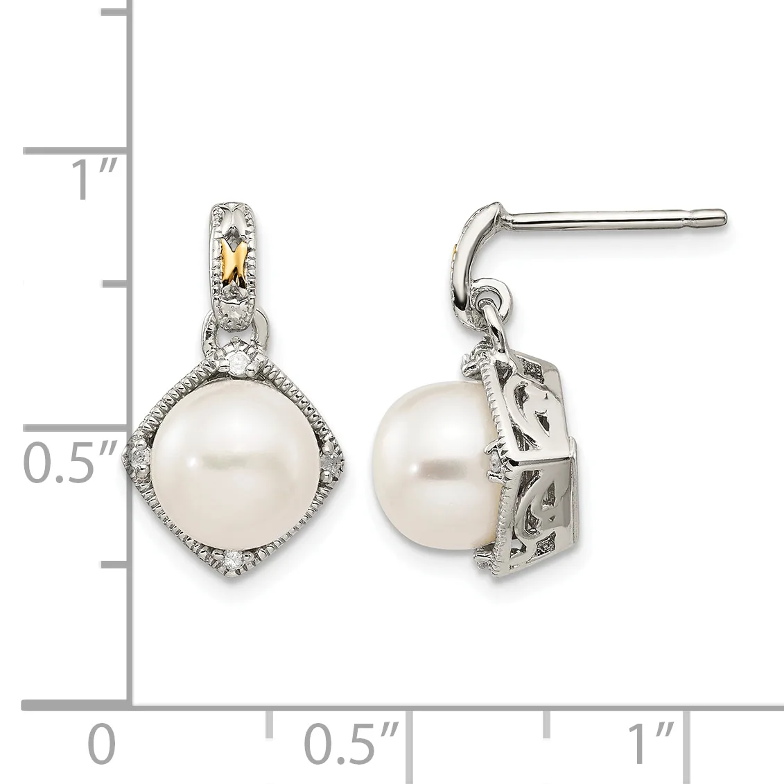 Pair of silver and gold two-tone dangle earrings with white pearl drops surrounded by diamond accents, shown next to a ruler for scale.