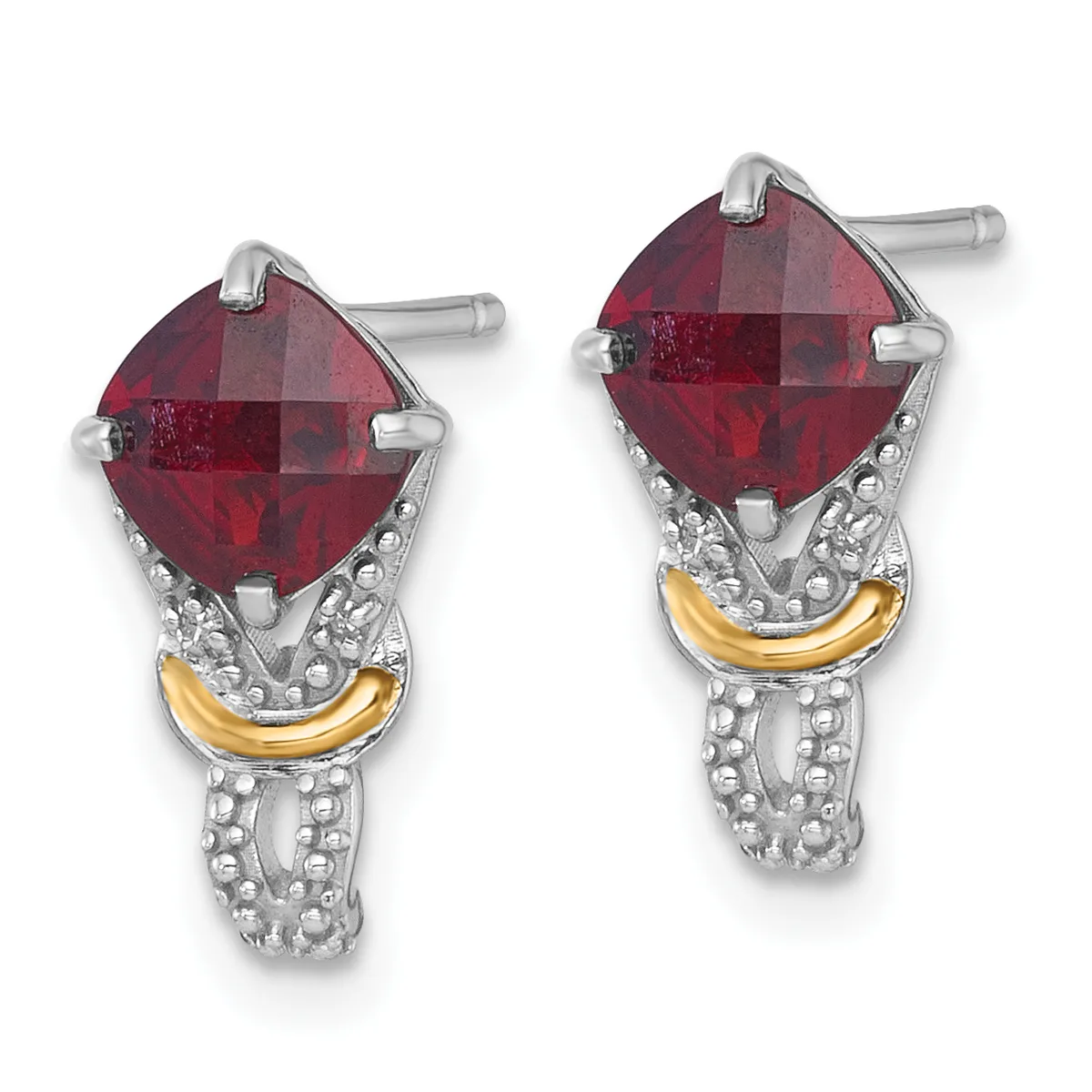 Pair of silver and gold-tone stud earrings with cushion-cut faceted red gemstones and textured metal detailing.