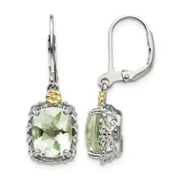A pair of silver and gold-tone leverback earrings with cushion-cut pale green gemstones surrounded by ornate metalwork.