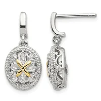 Pair of silver drop earrings with oval decorative pendants featuring gold-tone floral centers and diamond accents, shown from front and side views.