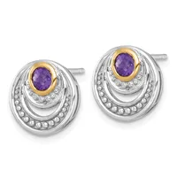 Pair of silver stud earrings with gold-plated bezels featuring oval amethyst stones surrounded by concentric oval frames set with small crystals.