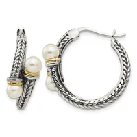 Pair of silver twisted rope hoop earrings with three white pearl accents and gold-tone spacer bands, shown from front and side views.