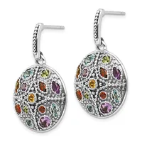 Pair of silver oval dangle earrings with textured surfaces set with multiple oval-cut gemstones in various colors including purple, red, yellow, and green.