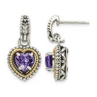 Pair of silver drop earrings with gold-tone beaded heart-shaped frames holding faceted purple amethyst stones, shown from front and side views.