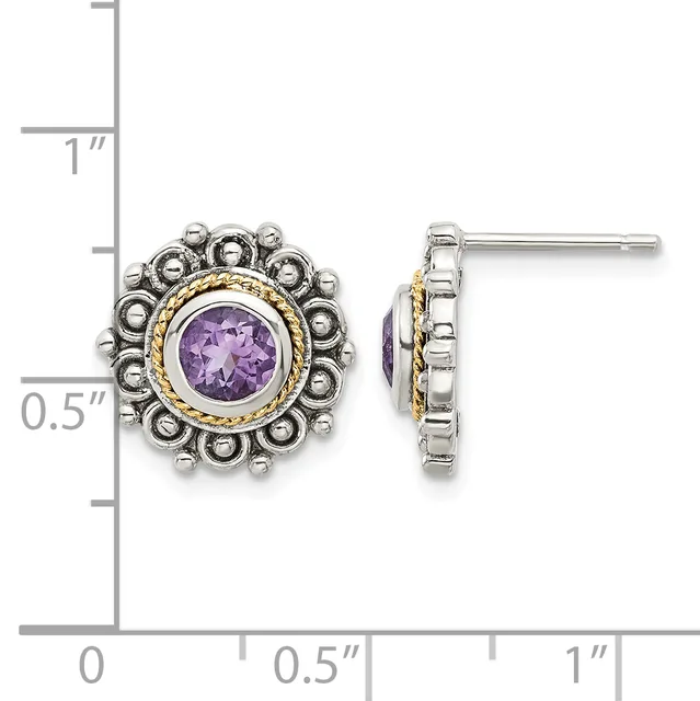 Pair of silver and gold-tone stud earrings with round purple amethyst centers surrounded by a halo of small beaded spheres, displayed next to a measurement ruler.