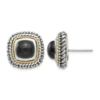 Pair of square stud earrings with black onyx centers surrounded by twisted gold wire and beaded silver borders, shown from front and side views.