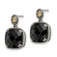 A pair of silver drop earrings with gold accents featuring cushion-cut black onyx stones surrounded by twisted rope detailing and ornamental oval tops.