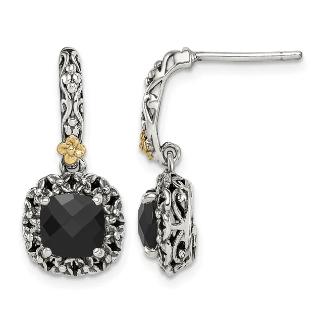 Pair of ornate silver drop earrings with filigree details, gold accents, and faceted black stone pendants surrounded by decorative metalwork.
