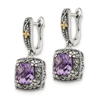 Pair of silver and gold two-tone drop earrings with faceted purple amethyst cushion stones surrounded by decorative filigree and beaded borders.